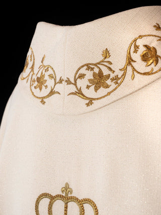 Liturgical chasuble with an embroidered Marian emblem and a golden crown