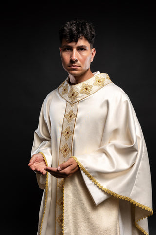 Ecru liturgical chasuble with an embroidered band and collar adorned with stones