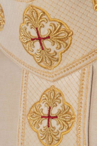 Ecru liturgical chasuble with an embroidered band and collar featuring crosses