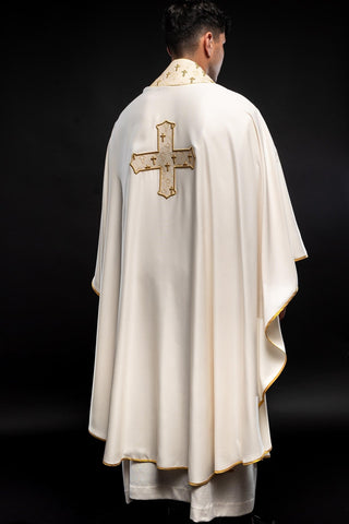 Ecru liturgical chasuble with richly embroidered cross and collar