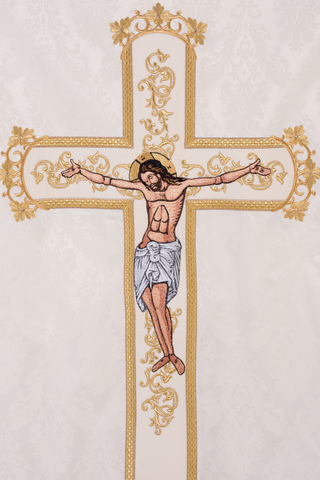 Ecru chasuble with an embroidered image of Christ and gold-satin finish