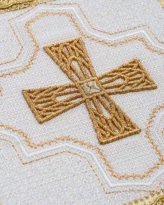 A set of four embroidered liturgical palls in eucharistic colors