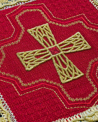 A set of four embroidered liturgical palls in eucharistic colors