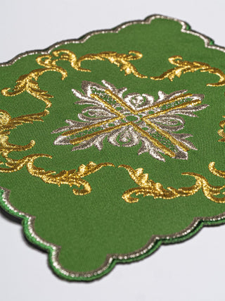 A complete set of green chalice linens with an embroidered cross